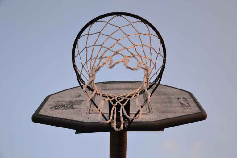 low angle photography of brown and black basketball hoop